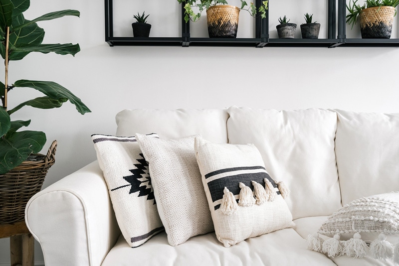 comfort couch with cushions in linen covers interior design