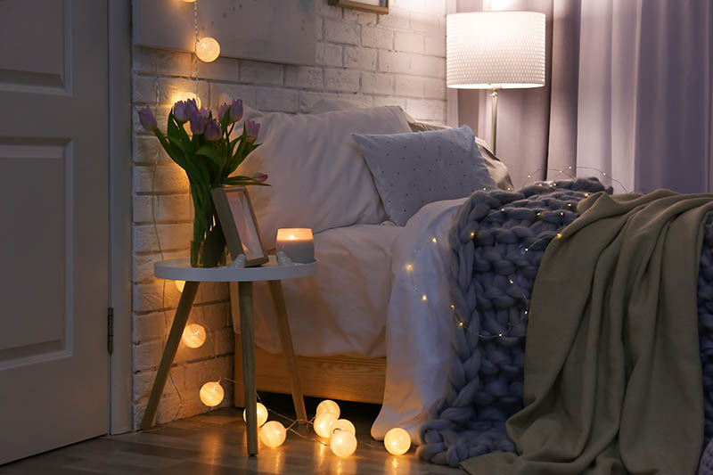 Cozy room interior with comfortable bed