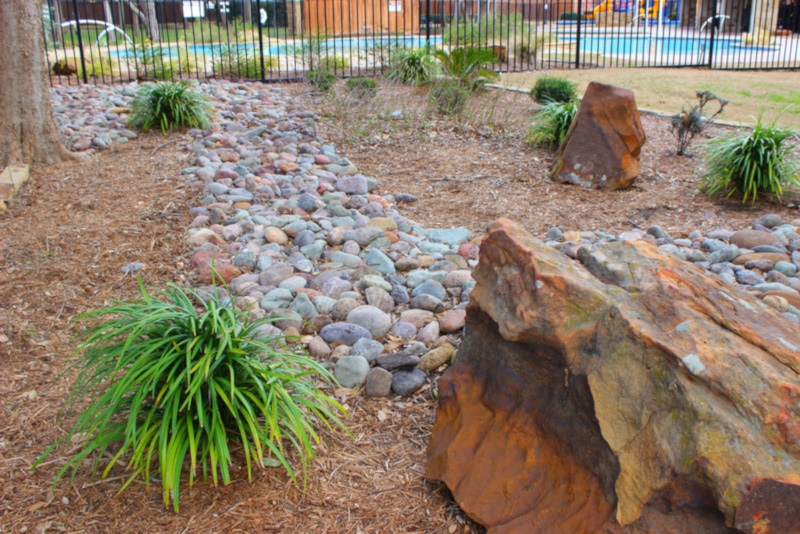 Landscaping with river rock as accent