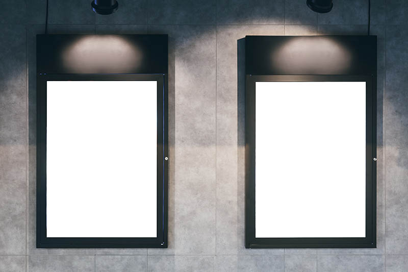 Mock up Poster frame with spotlight on wall