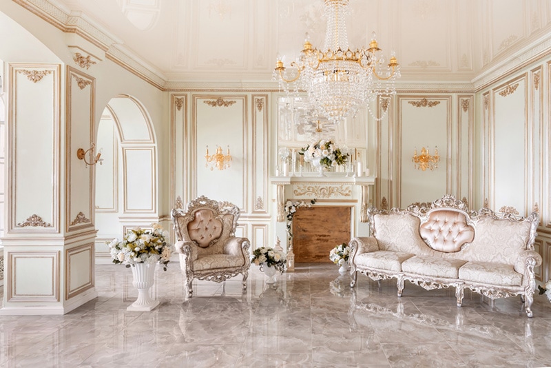 Morning in luxurious light interior in mansion . Bright and clean interior design of a luxury living room