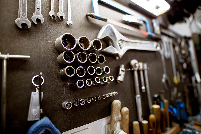 Workshop tool holder with a wrench and set of wrench sockets