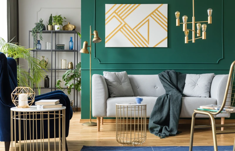 gold, green, and grey accents in contemporary living room interior
