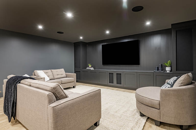 interior media room with dark grey walls