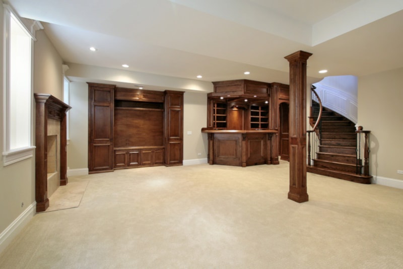 Basement with wood cabinetry