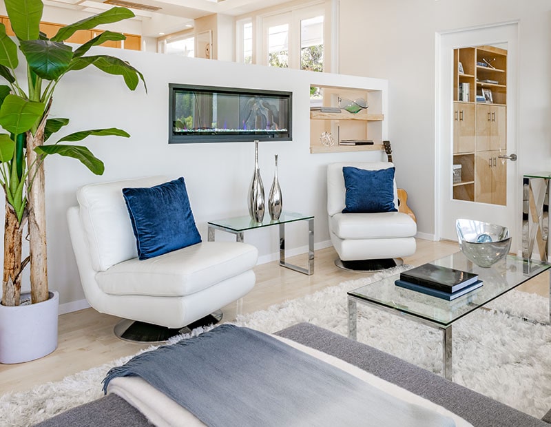 Contemporary Pacific Northwest Home with blue sky and water views bright white interior