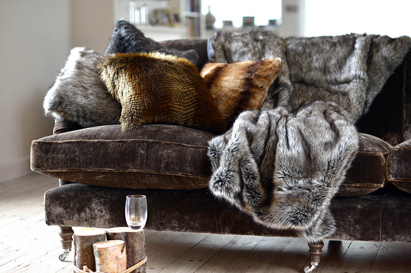 Faux fur throws and cushions room interior