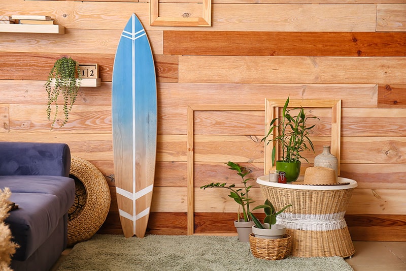 Interior of modern room with surfboard