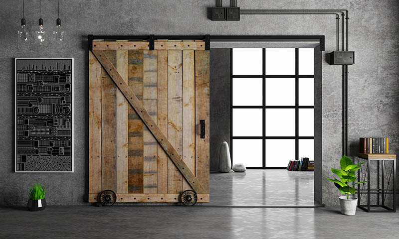 Modern interior in loft style barn sliding wooden door in loft room